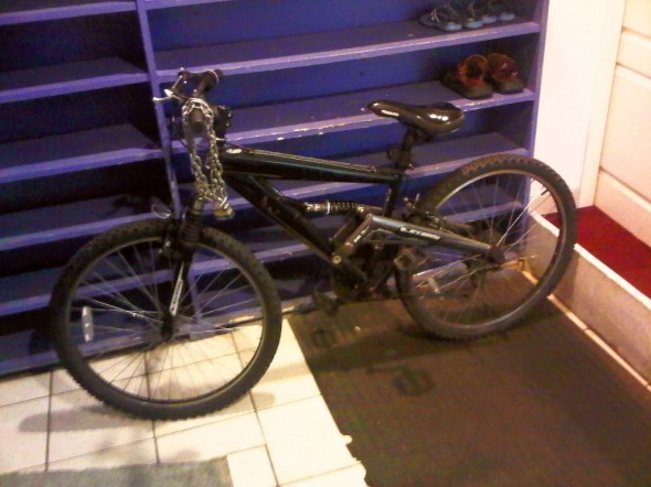 03 - Ibrahim Jam-E Mosque - Bicycle brought into Shoe Shelf area - Hamilton Ontario - Wednesday August 7 2013