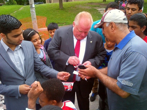 Masiullah Mohebzada with Toronto Mayor Rob Ford in Cougar Court, Ward 36 Scarborough South West
